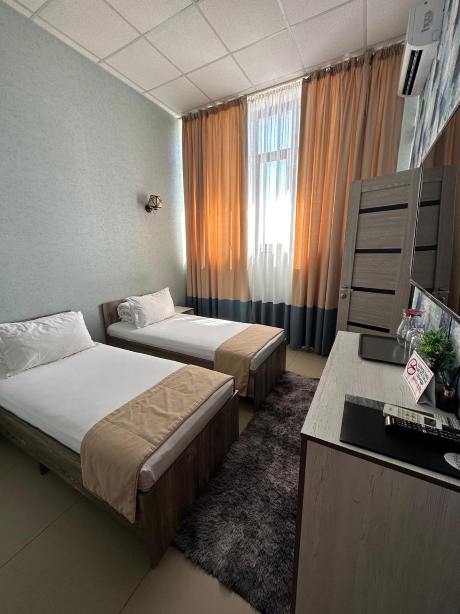 Tarlan Hotel Aqtau Buitenkant foto